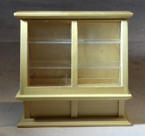 Dolls house shop display - dolls,