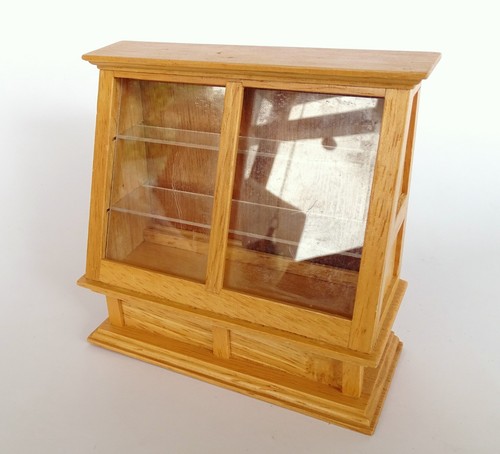 Dolls house shop display - dolls,